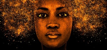 Black woman with golden speckled afro