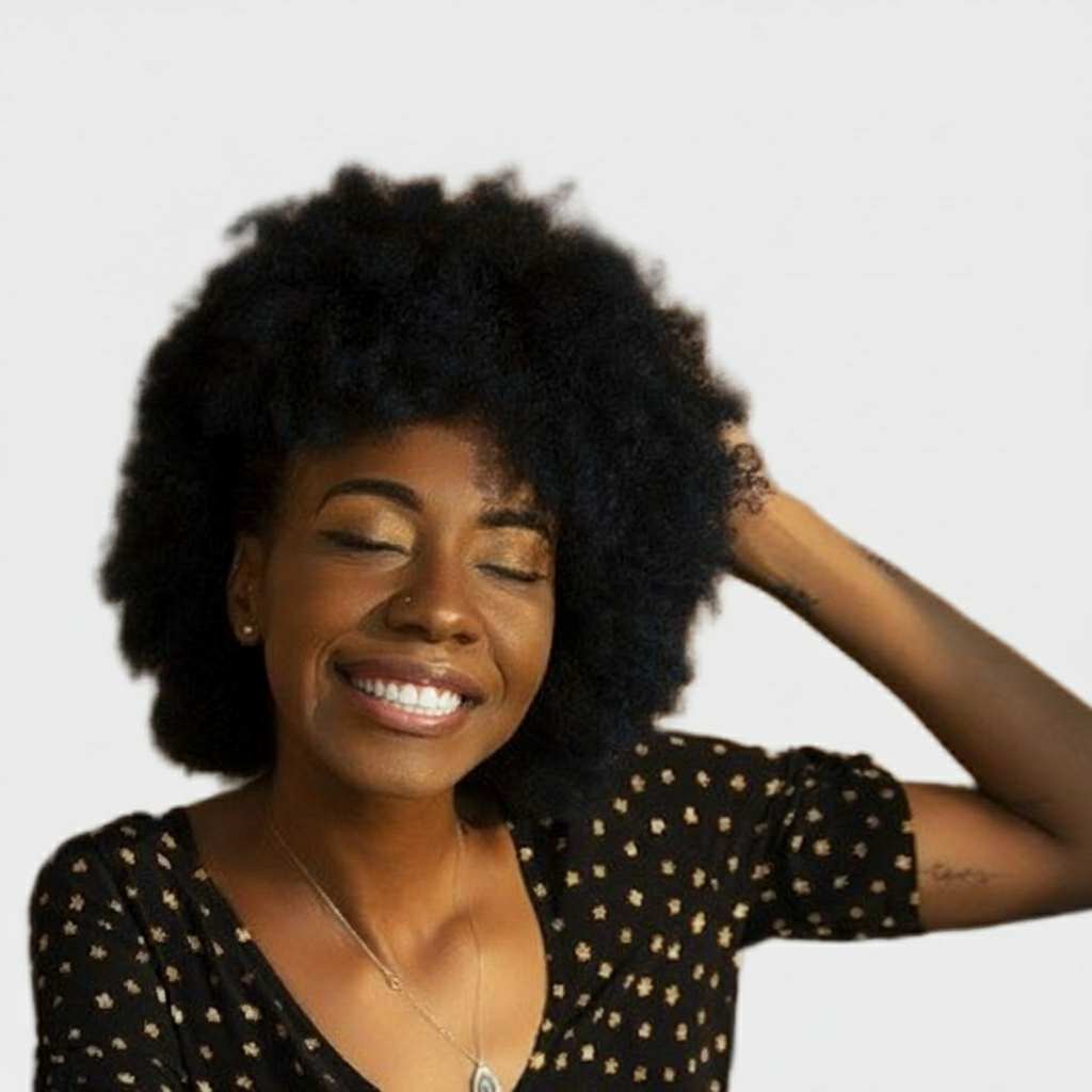 Dark hair black woman with afro and smiling